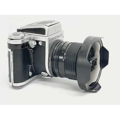 276 - A Pentacon Six TL camera in case with a Zodiak Lens for KIEV in case with accessories.