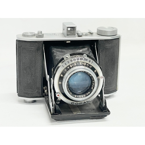 293 - An Olympus Six folding camera. 24894. 6x6 4.5x6.