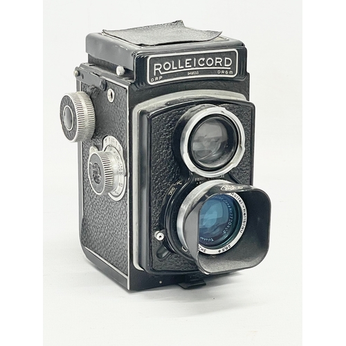 292 - A Rolleicord camera in case.