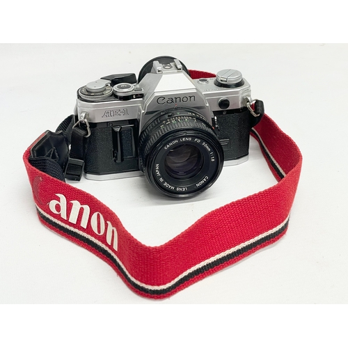 295 - A Canon AE-1 camera.