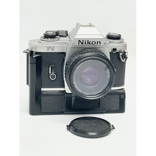 296 - A Nikon FG camera with Nikon bag and accessories. Including a Nikon Series E lens 75-150mm 1:3.5. Ni... 