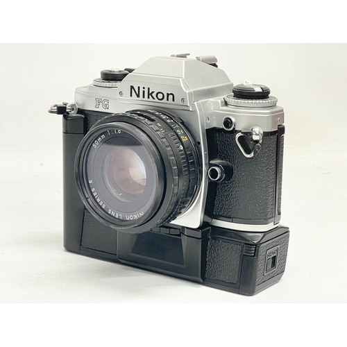 296 - A Nikon FG camera with Nikon bag and accessories. Including a Nikon Series E lens 75-150mm 1:3.5. Ni... 