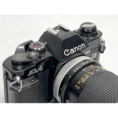 298 - A Canon AL-1 camera.