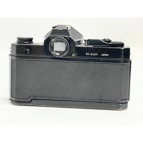 303 - A Nikon Nikkormat FT2 camera. 5155977