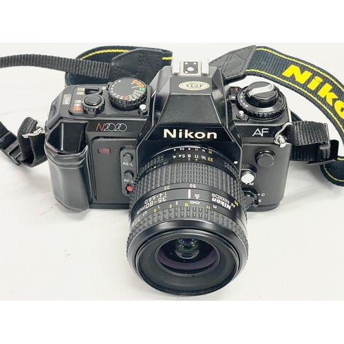 304 - A Nikon AF N2020 camera.