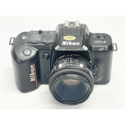 312 - A Nikon F-401 AF camera.