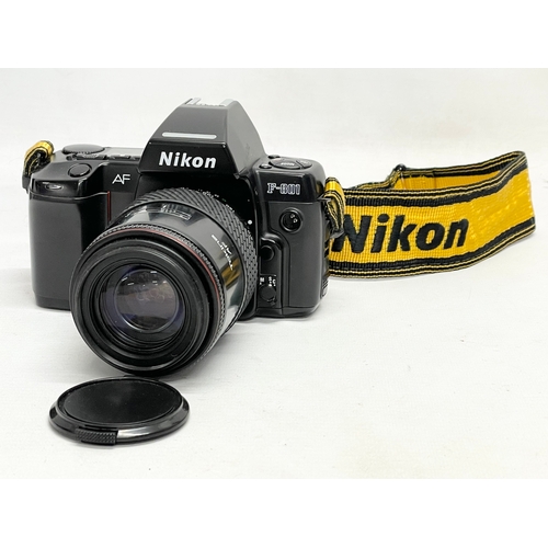 319 - A Nikon F-801 AF camera.