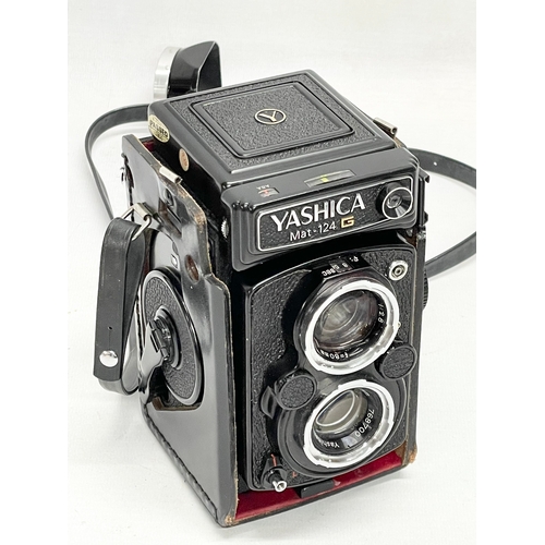 406 - A Yashica Mat-124 G camera in case.