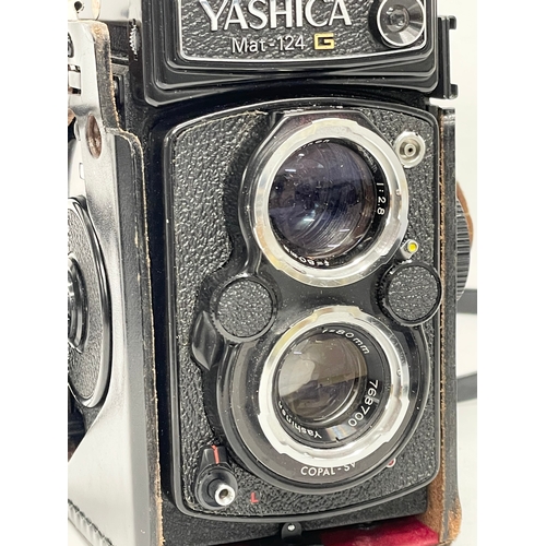 406 - A Yashica Mat-124 G camera in case.