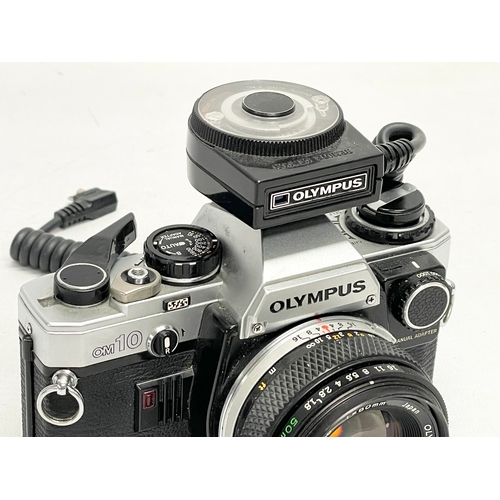 413 - An Olympus OM10 camera.