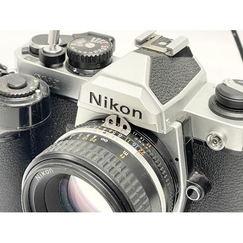 414 - A Nikon FM2 camera.