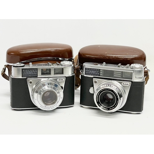 416 - 2 Kodak cameras. A Kodak Retina Automatic III camera in case. A Kodak Retinette IB camera in case.