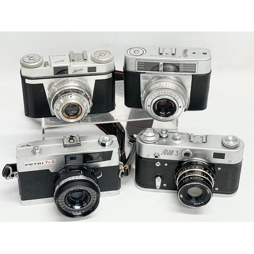 419 - 4 vintage cameras. A Zeiss Ikon Contessa camera. A lloca Quick-B camera. A FED 3 camera. A Petri 7S ... 