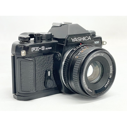 422 - A Yashica FX-3 Super 2000 camera.