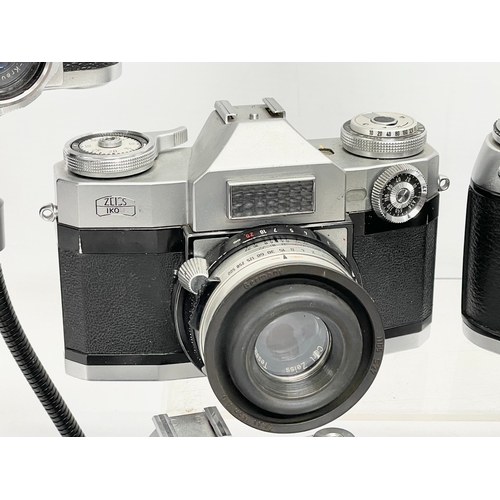 425 - 5 vintage cameras. 2 Contaflex Zeiss Ikon cameras. A Retinette IA camera. A Braun Nurnberg Paxette c... 