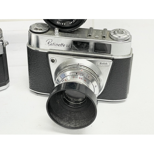 425 - 5 vintage cameras. 2 Contaflex Zeiss Ikon cameras. A Retinette IA camera. A Braun Nurnberg Paxette c... 