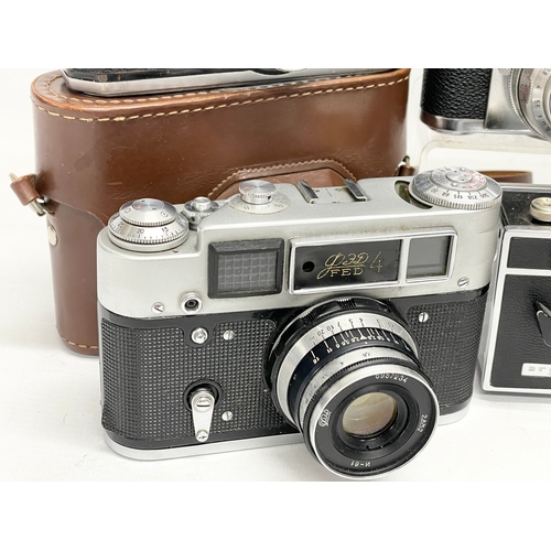 432 - A collection of vintage cameras. A Zeiss Ikon Compur Rapid folding camera. A Lubitel 166 Universal c... 