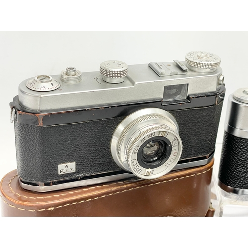 432 - A collection of vintage cameras. A Zeiss Ikon Compur Rapid folding camera. A Lubitel 166 Universal c... 