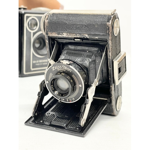 436 - A quantity of vintage folding cameras and brownies. Some with cases. A Kodak Six-20 folding camera i... 