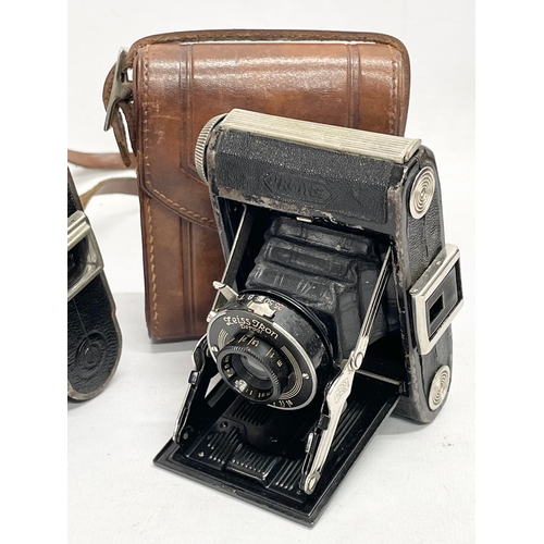 436 - A quantity of vintage folding cameras and brownies. Some with cases. A Kodak Six-20 folding camera i... 