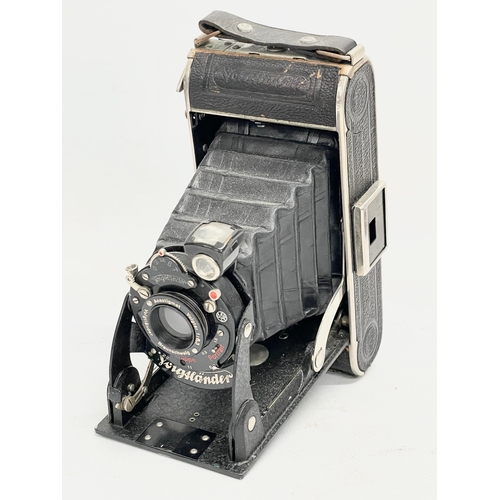 436 - A quantity of vintage folding cameras and brownies. Some with cases. A Kodak Six-20 folding camera i... 