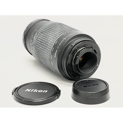 438 - A Nikon AF Nikkor 70-300nm lens with a Nikon Speedlight SB-12.