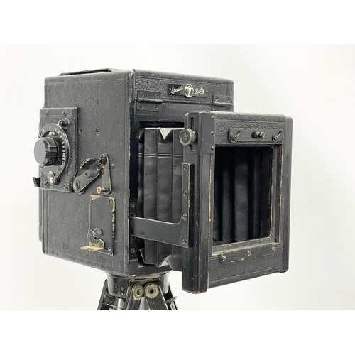 443 - A Thornton Pickard Special Ruby plate camera with accessories and tripod stand by J. Lizars.