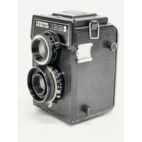 450 - A Nomo Lubitel 166B camera in case.