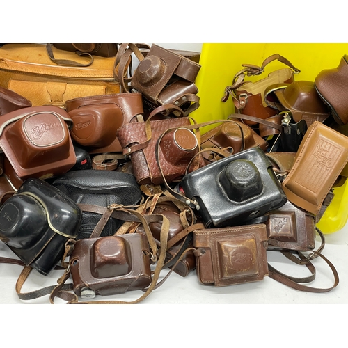 457 - A large quantity of vintage camera cases.