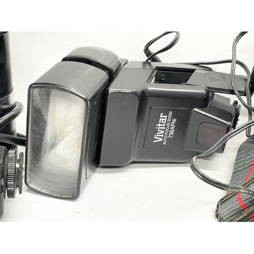 461 - A quantity of camera flashes and equipment etc. a Metz Mecablitz 60 CT-4. A Nikon Quick Charger MH-2... 