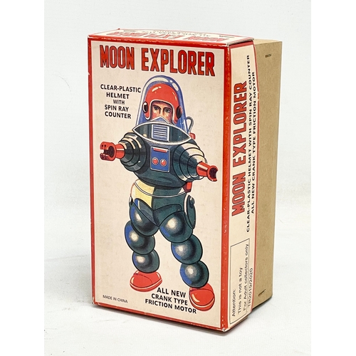 531 - 2 tin plate wine up toys in boxes. A Moon Explorer in box and a Bugatti T-35 Racer in box.