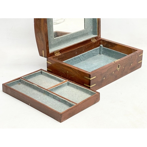 205 - A brass inlaid Indian rosewood dome top jewellery box. 30.5x20.5x13cm.