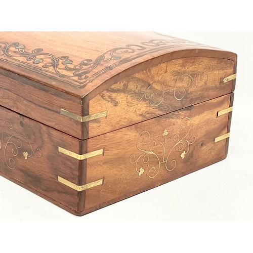 205 - A brass inlaid Indian rosewood dome top jewellery box. 30.5x20.5x13cm.