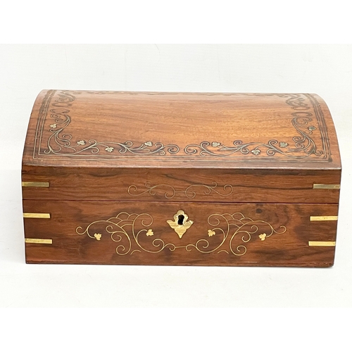 205 - A brass inlaid Indian rosewood dome top jewellery box. 30.5x20.5x13cm.