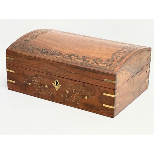 205 - A brass inlaid Indian rosewood dome top jewellery box. 30.5x20.5x13cm.