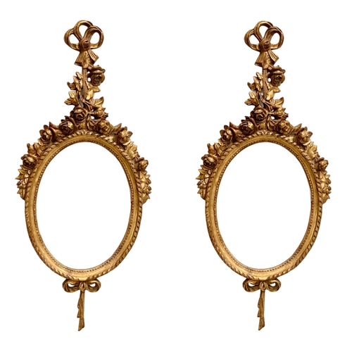 50 - A pair of good quality 18th century style gilt framed bevelled mirrors. 47x106cm