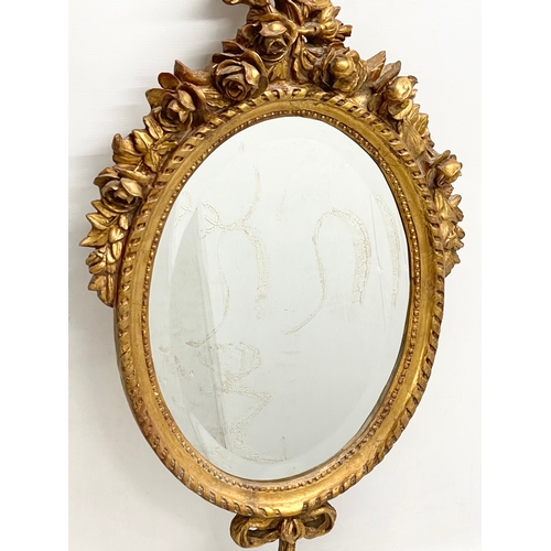 50 - A pair of good quality 18th century style gilt framed bevelled mirrors. 47x106cm