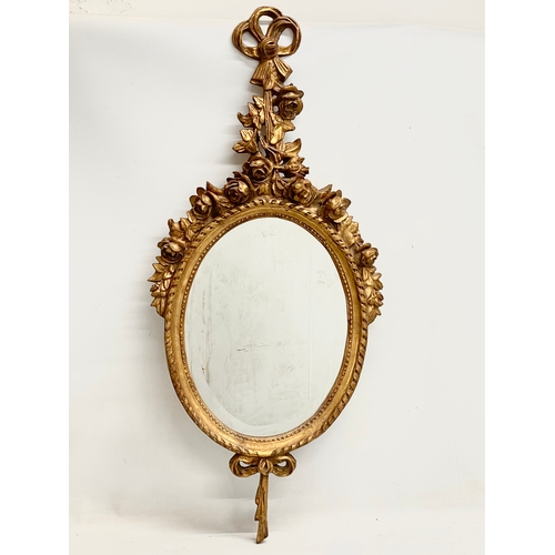 50 - A pair of good quality 18th century style gilt framed bevelled mirrors. 47x106cm