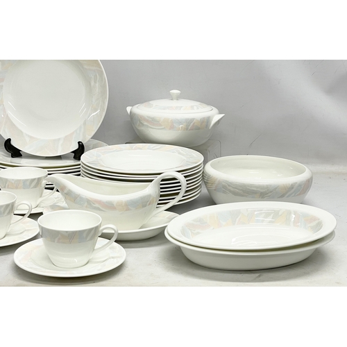 615 - A 58 piece Wedgwood ‘Pastel’ pattern dinner, tea and coffee set.