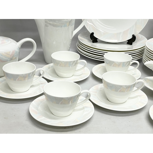 615 - A 58 piece Wedgwood ‘Pastel’ pattern dinner, tea and coffee set.