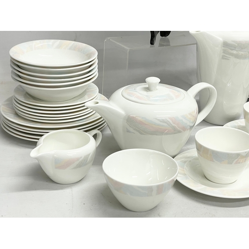 615 - A 58 piece Wedgwood ‘Pastel’ pattern dinner, tea and coffee set.