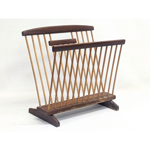 9 - A Mid Century teak magazine rack. 38.5x22x38cm