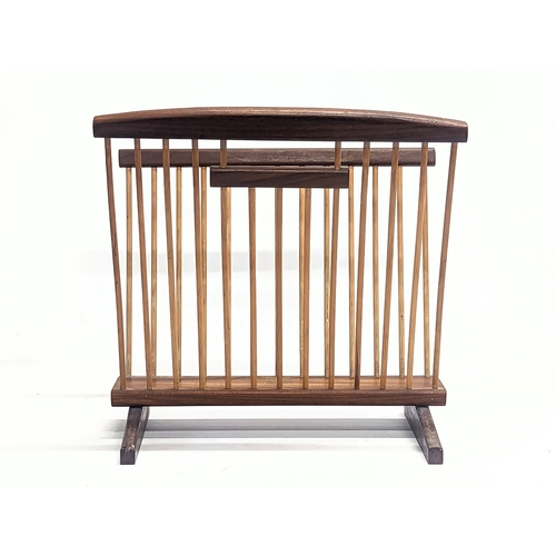 9 - A Mid Century teak magazine rack. 38.5x22x38cm