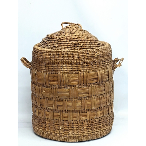 14 - 2 1970s Mid Century wicker 2 handled hampers. Largest measures 48x59cm