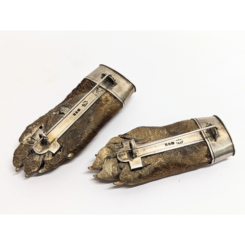 747 - A pair of silver mounted taxidermy ferret feet. Circa 1912.