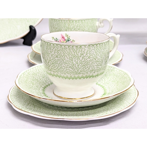 666 - A 36 piece Queen Anne tea set including 2 cake plates.