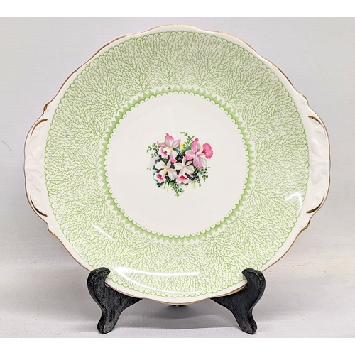 666 - A 36 piece Queen Anne tea set including 2 cake plates.