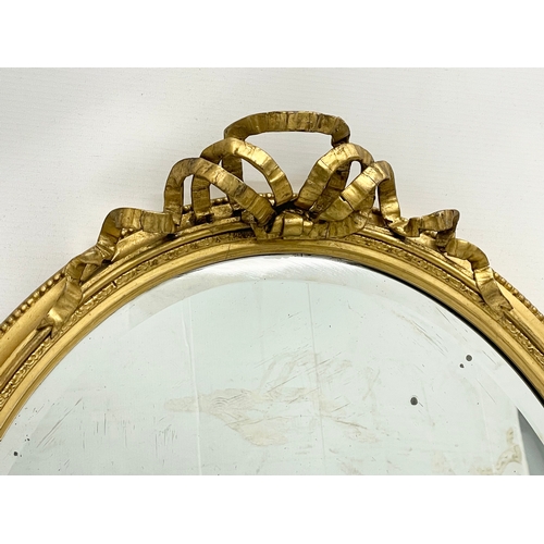 327 - A Regency gilt framed mirror. With later back. Circa 1810-1820. 53x69cm