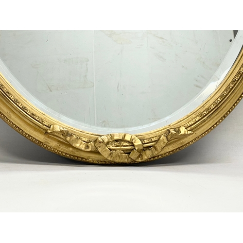 327 - A Regency gilt framed mirror. With later back. Circa 1810-1820. 53x69cm