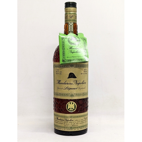 151 - A bottle of unopened Mandarine Napoleon Liqueur in original box, bottled 1970s. 1 Litre.